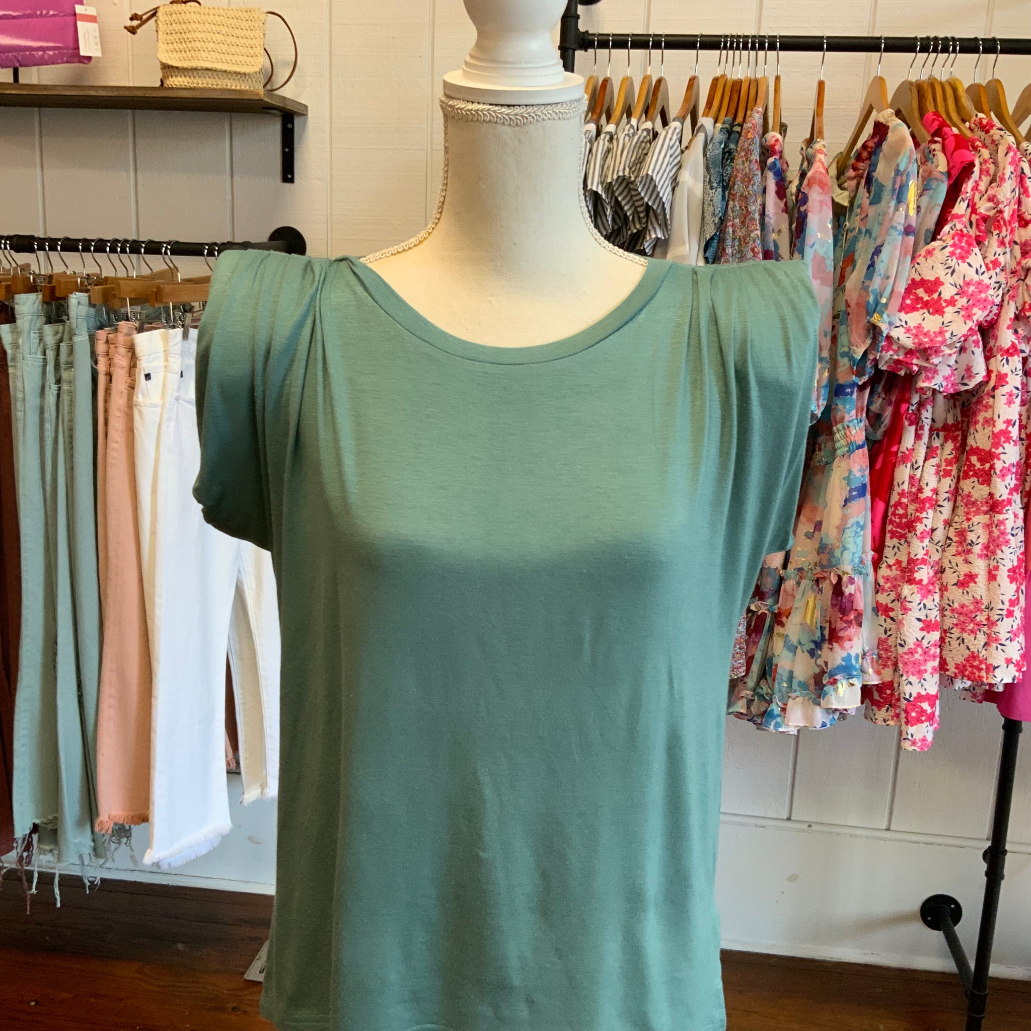 Umgee Sleeveless Jersey Top W/Shoulder Pads & Pleats Top