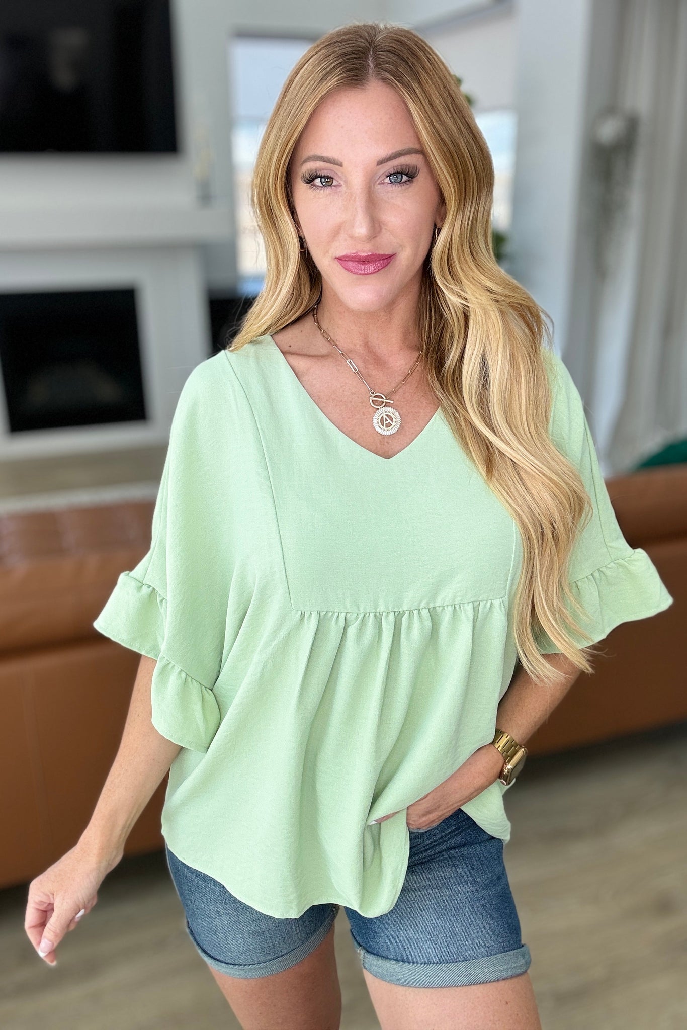 Airflow Peplum Ruffle Sleeve Top in Sage